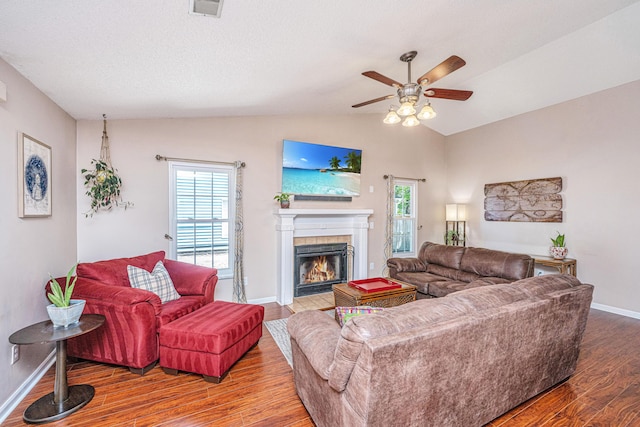 2016 Wild Flower Ln, Charleston, SC 29414 - living room featuring ceiling fan, wood finished floors, healthy amount of natural light, a fireplace, and lofted ceiling