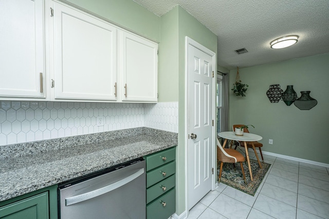 2016 Wild Flower Ln, Charleston, SC 29414 - kitchen with stainless steel dishwasher, green cabinets, white cabinets, tasteful backsplash, and a textured ceiling
