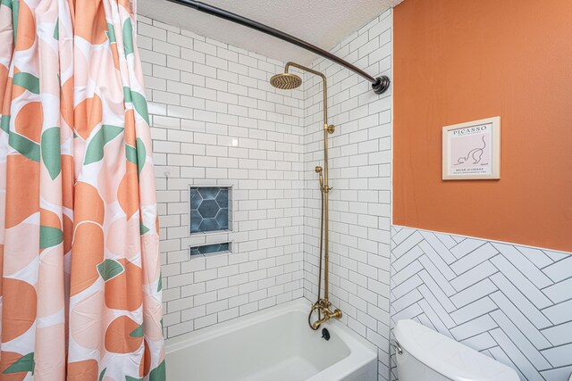 2016 Wild Flower Ln, Charleston, SC 29414 - full bathroom featuring shower / tub combo with curtain, toilet, a textured ceiling, and tile walls