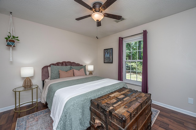 2016 Wild Flower Ln, Charleston, SC 29414 - bedroom with wood finished floors, baseboards, a ceiling fan, and a textured ceiling