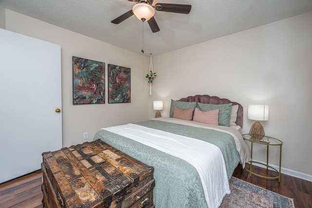 2016 Wild Flower Ln, Charleston, SC 29414 - bedroom with wood finished floors, a ceiling fan, baseboards, and a textured ceiling