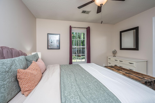 2016 Wild Flower Ln, Charleston, SC 29414 - bedroom featuring ceiling fan and a textured ceiling