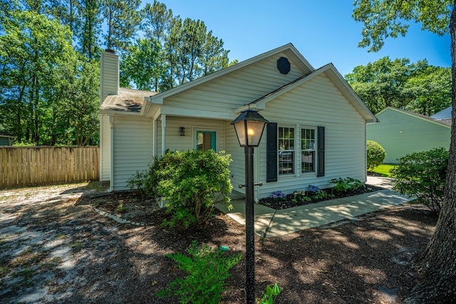 2016 Wild Flower Ln, Charleston, SC 29414 - view of front of house featuring a chimney