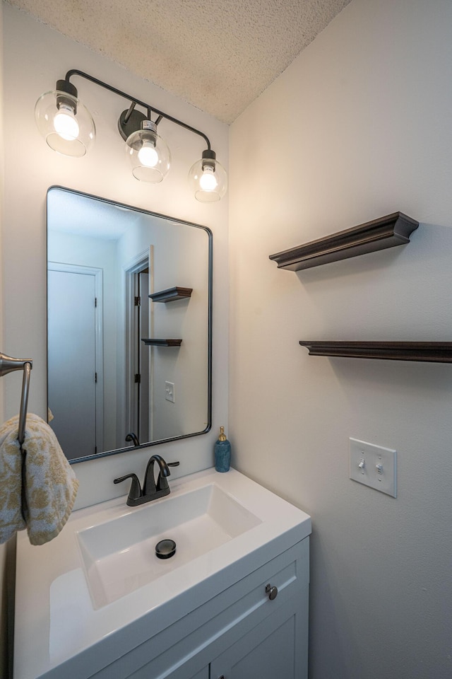 2016 Wild Flower Ln, Charleston, SC 29414 - bathroom featuring a textured ceiling and vanity