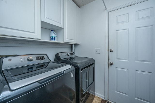2016 Wild Flower Ln, Charleston, SC 29414 - washroom featuring independent washer and dryer, cabinet space, wood finished floors, and baseboards