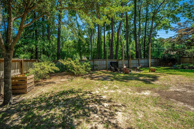 2016 Wild Flower Ln, Charleston, SC 29414 - view of yard with an outdoor fire pit