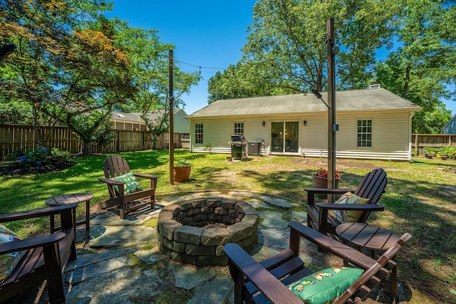 2016 Wild Flower Ln, Charleston, SC 29414 - rear view of house with a fire pit, a patio area, and a chimney