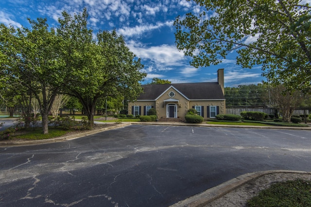 2016 Wild Flower Ln, Charleston, SC 29414 - view of front of property featuring uncovered parking and a chimney