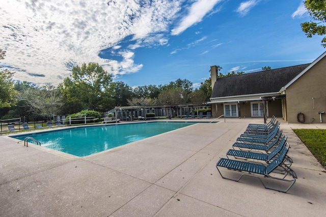 2016 Wild Flower Ln, Charleston, SC 29414 - community pool with french doors and a patio area