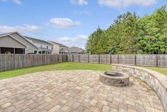 view of patio featuring an outdoor fire pit