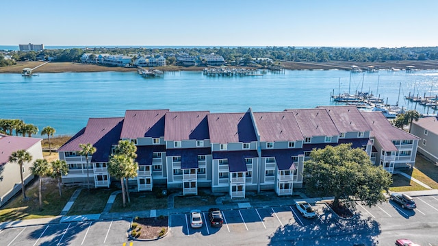 drone / aerial view featuring a water view