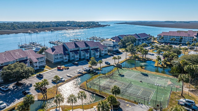 birds eye view of property with a water view