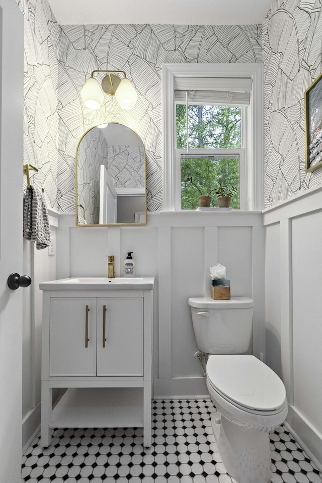 bathroom with vanity and toilet