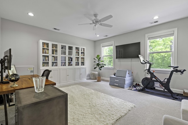 carpeted office featuring visible vents, recessed lighting, baseboards, and ceiling fan