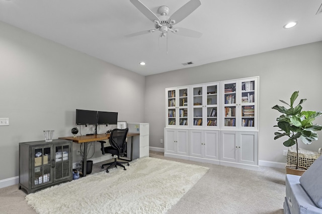 office featuring a ceiling fan, visible vents, carpet floors, baseboards, and recessed lighting