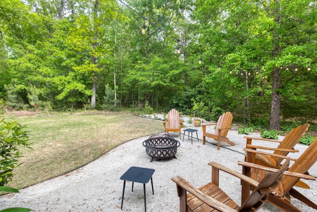 view of patio featuring a fire pit