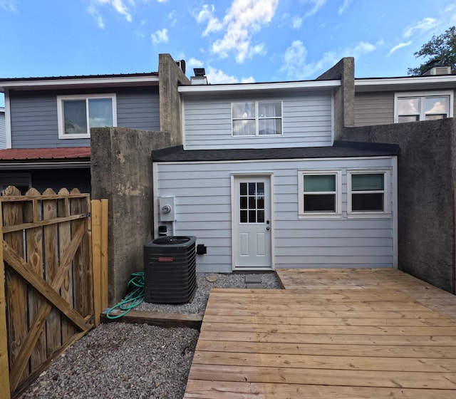 712 Nora Ln, Mount Pleasant, SC 29464 - rear view of property with central air condition unit, a wooden deck, and a gate