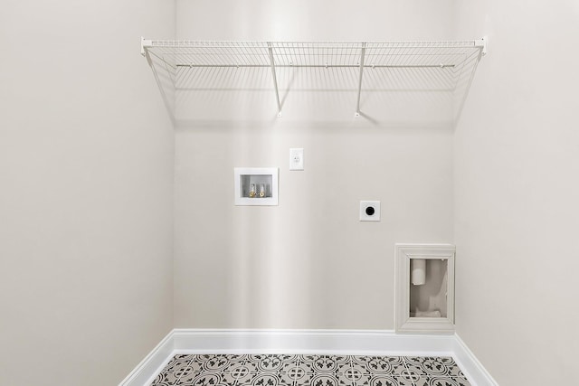 washroom featuring hookup for a washing machine, electric dryer hookup, laundry area, baseboards, and tile patterned floors