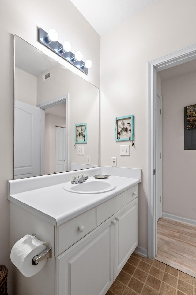 1300 Park Blvd W Unit 106, Mount Pleasant, SC 29466 - bathroom featuring vanity and wood finished floors
