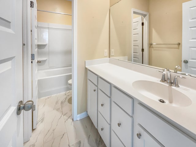 full bathroom with washtub / shower combination, vanity, and toilet