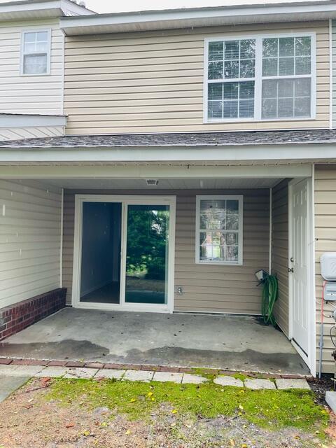 145 Taylor Cir, Goose Creek, SC 29445 - rear view of property featuring a patio