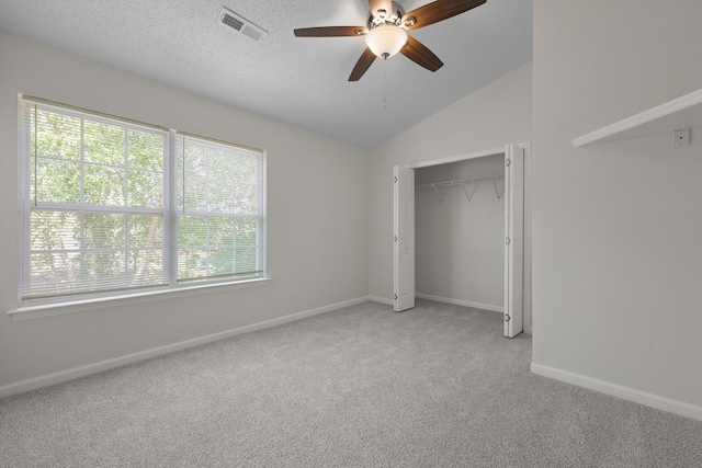 145 Taylor Cir, Goose Creek, SC 29445 - unfurnished bedroom featuring light carpet, baseboards, lofted ceiling, a closet, and ceiling fan