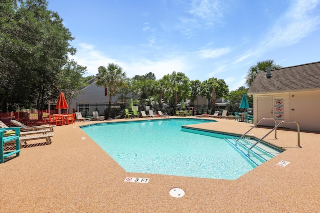 145 Taylor Cir, Goose Creek, SC 29445 - community pool featuring a patio area and fence