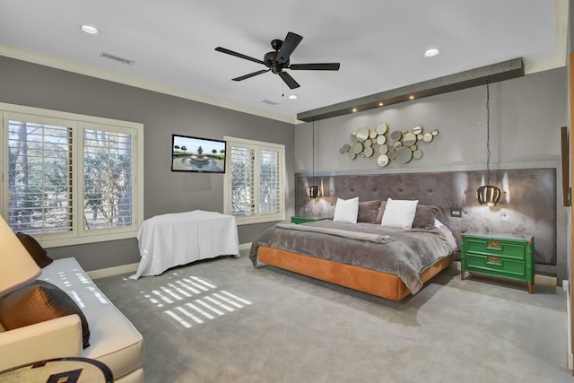 carpeted bedroom with ceiling fan, recessed lighting, visible vents, baseboards, and ornamental molding