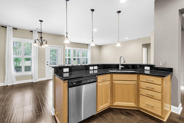 kitchen featuring pendant lighting, a chandelier, sink, dark hardwood / wood-style flooring, and stainless steel dishwasher