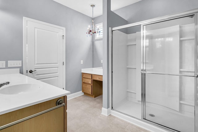 bathroom with vanity and an enclosed shower