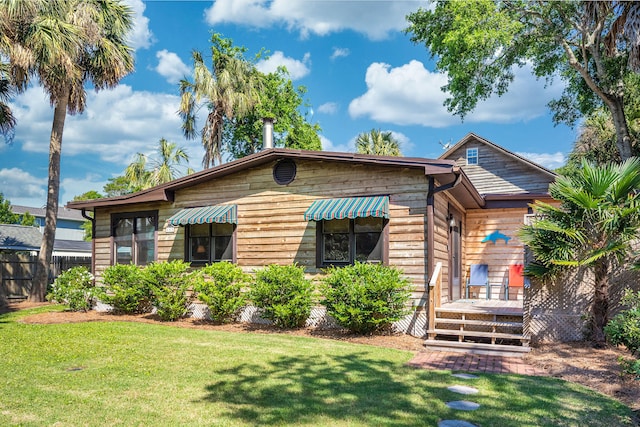 exterior space featuring a front lawn