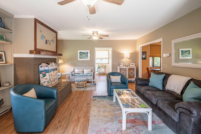 living room with a healthy amount of sunlight and hardwood / wood-style flooring