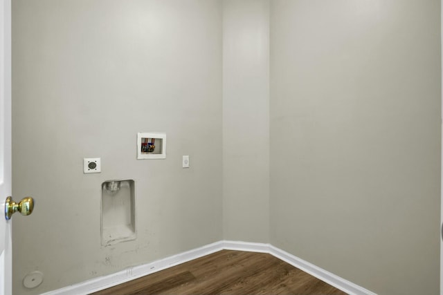 washroom with washer hookup, electric dryer hookup, wood finished floors, laundry area, and baseboards