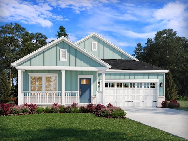 craftsman house with covered porch, a front yard, and a garage