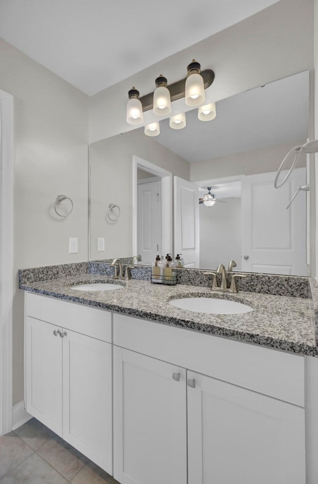 bathroom featuring vanity, ceiling fan, and tile patterned floors