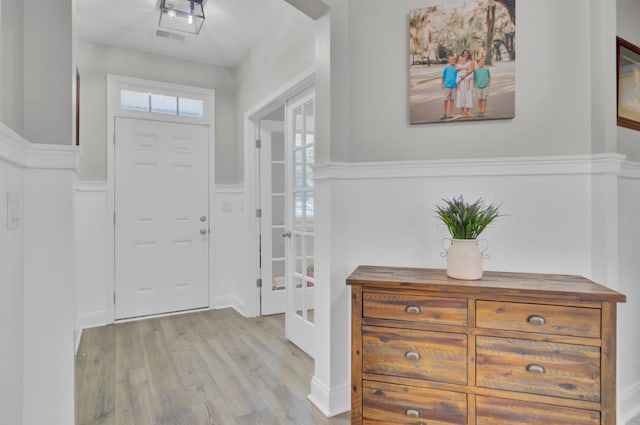 entrance foyer with light hardwood / wood-style floors