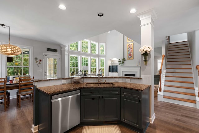 3574 Toomer Kiln Cir, Mount Pleasant, SC 29466 - kitchen with dishwasher, open floor plan, dark stone counters, decorative columns, and recessed lighting