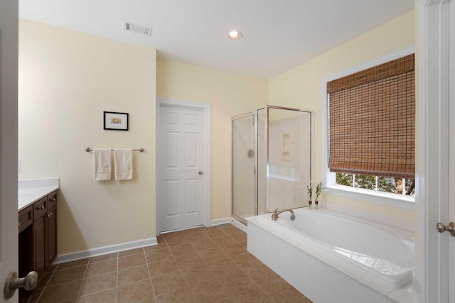 3574 Toomer Kiln Cir, Mount Pleasant, SC 29466 - full bathroom featuring a bath, vanity, a shower stall, recessed lighting, and tile patterned flooring