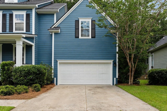 3574 Toomer Kiln Cir, Mount Pleasant, SC 29466 - view of front of house with a garage, driveway, and roof with shingles