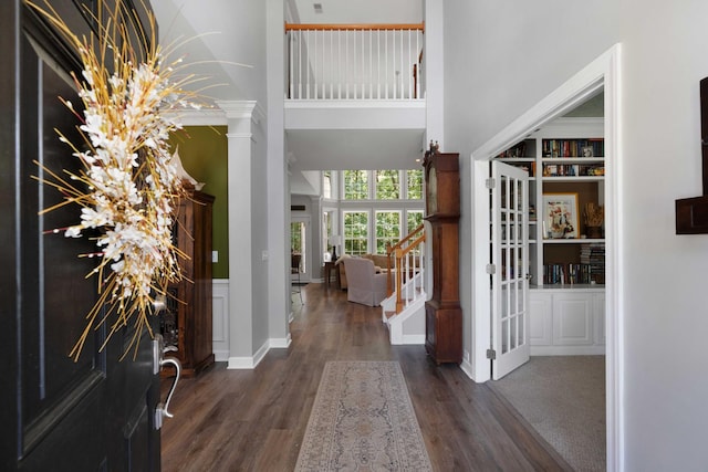 3574 Toomer Kiln Cir, Mount Pleasant, SC 29466 - foyer with a high ceiling, wood finished floors, decorative columns, and stairway