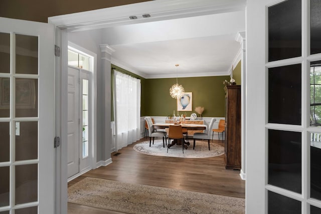 3574 Toomer Kiln Cir, Mount Pleasant, SC 29466 - dining room featuring crown molding, wood finished floors, and a chandelier