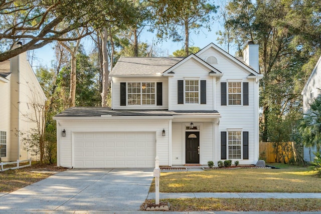 traditional-style home featuring a chimney, fence, a garage, driveway, and a front lawn