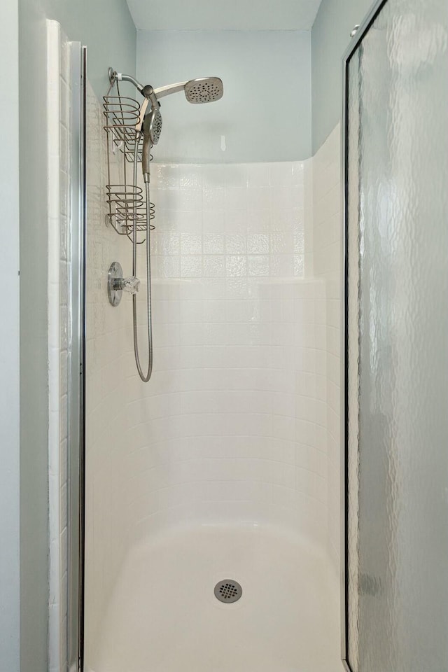 full bath featuring a stall shower