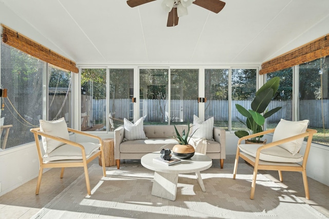 sunroom / solarium featuring vaulted ceiling and ceiling fan