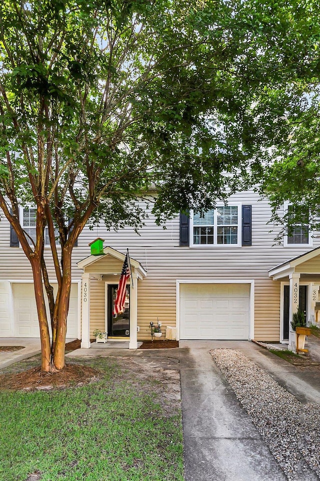 4030 Babbitt St, Charleston, SC 29414 - view of front of house with an attached garage and asphalt driveway