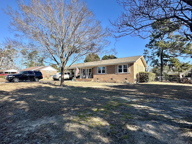 single story home with a front yard