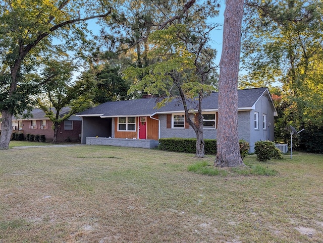 ranch-style house with a front yard