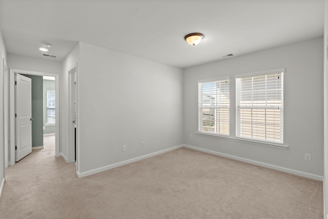 view of carpeted spare room