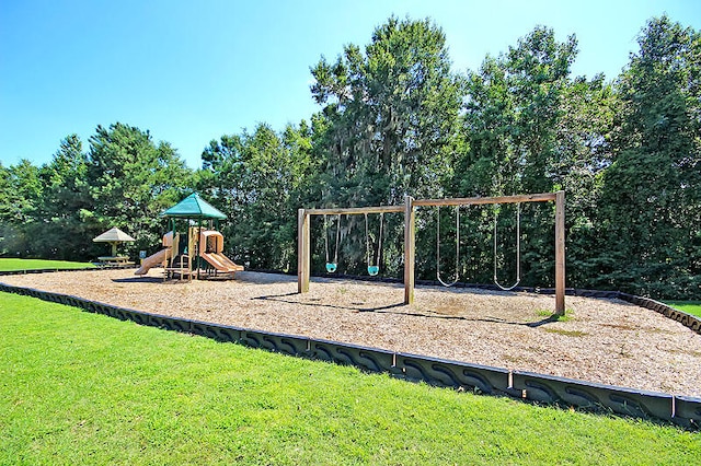 view of jungle gym featuring a yard