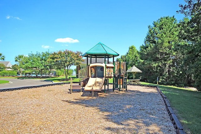 view of jungle gym with a yard